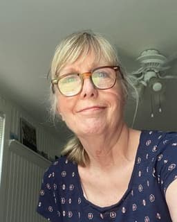 Justine M Lambroschino