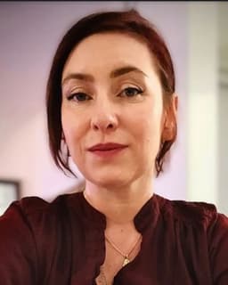 Dr. Aurora Roseline Lane