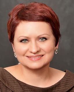 Dr. Angela E. Legner