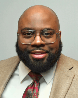 Dr. Christopher L Howard