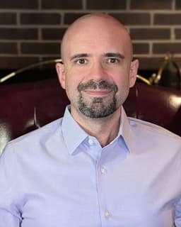 Dr. Brian A Sharpless