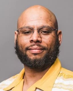 Daniel E Helvetius Jr