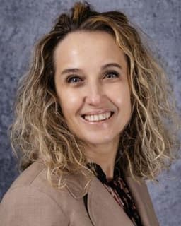 Dr. Cristina S Emrich