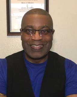 Dr. Neville M. White